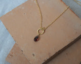 Collier "Vermeer" doré à l'or fin et grenat